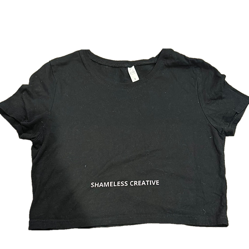 BLACK SHORT SLEEVE SHAMELESS CREATIVE CROP TOP WITH PINK LETTERING